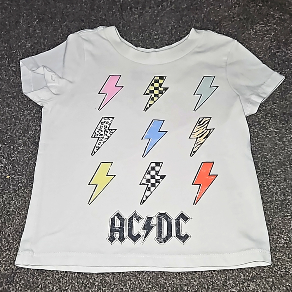 12 month AC/DC themed white short sleeved shirt.